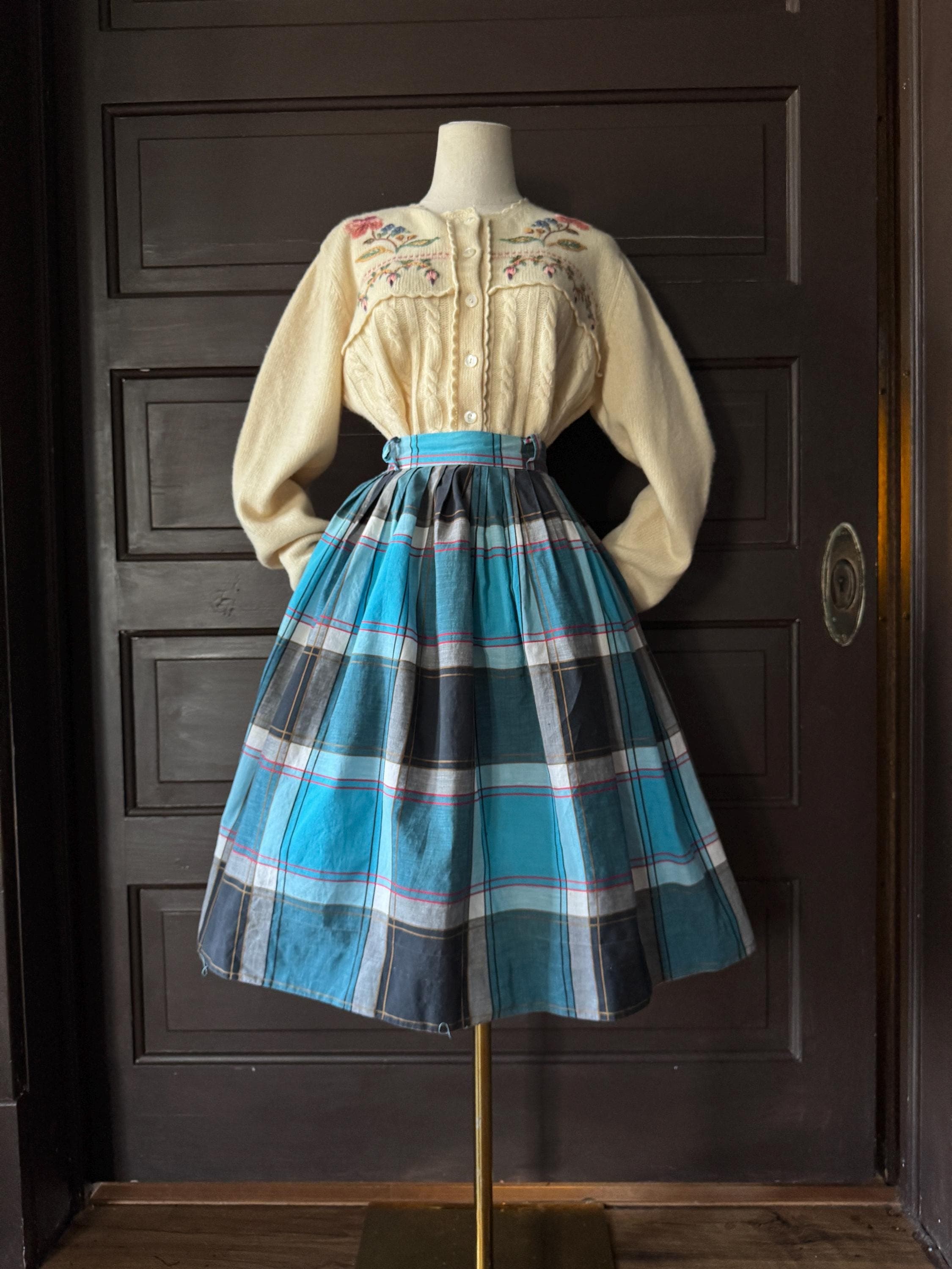 1950s  Blue plaid full skirt